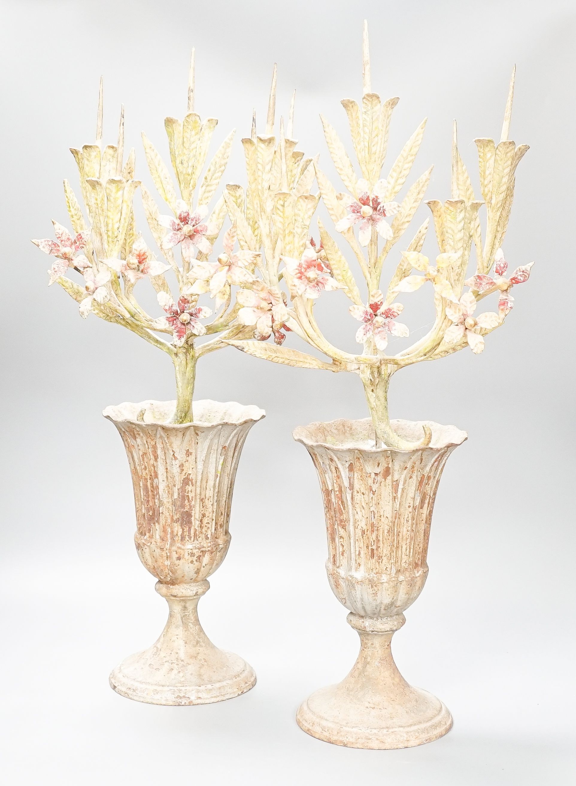 A pair of late 19th/early 20th century painted wrought iron, composition and cast iron 'flower' vases 60cm